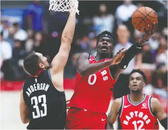  ?? TAKASHI AOYAMA/GETTY IMAGES ?? Toronto Raptors rookie Terence Davis II is a former football star who doesn’t shy away from contact on the floor. He says his big hands come in handy when it comes to handling the ball.