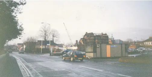  ??  ?? Pictured are the Tudor Mansions in Woodgate being demolished in 1992. Photo courtesy of Mary Sills.