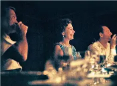  ??  ?? Guests of honour: the Queen at dinner on board the Royal Yacht Britannia in 1972