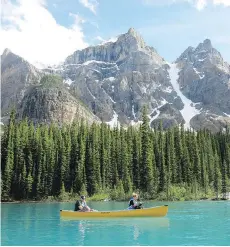  ?? JIM BYERS ?? A canoe ride on stunning Moraine Lake in Alberta is a Canadian experience not to be missed.