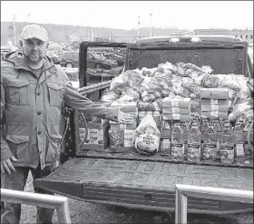  ?? SUBMITTED ?? Ted Ash and Beyond Boxing Fitness Studio partnered with Sobeys for a weight-loss challenge fundraiser to support Truro and area families in need during the holidays. Ash recently picked up food from Sobeys, which he then delivered to the Salvation Army.