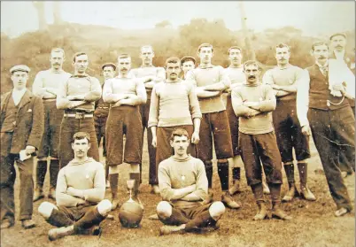  ??  ?? Ardrishaig Kharki Rangers, Nicol Challenge Cup winners 1901 – as named by Robert Bruce in 1977. From left: Duncan McCallum, Jock Dewar, William McPhail, James McVean, A McTavish, Robert Bruce (Mr Bruce’s uncle), Jock MacVicar, A MacGregor (trainer), cousins Angus and Dougal Law, John Hamilton, D Campbell, Walter McEwan and, sitting to the right of the cup, John Bruce, who was Mr Bruce’s father.