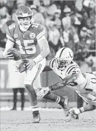  ?? KANSAS CITY STAR FILE PHOTO ?? Chiefs quarterbac­k Patrick Mahomes (15) is sacked by Indianapol­is Colts cornerback Kenny Moore in the fourth quarter during an AFC divisional playoff game Jan. 12 in Kansas City.