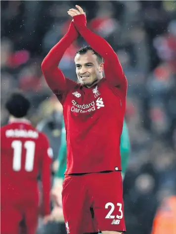  ??  ?? FAMILIAR POSE: Former Stoke City favourite Xherdan Shaqiri scored twice as Liverpool beat Manchester United 3-1 at Anfield. Picture: PA