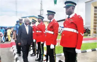  ??  ?? Chief Justice of Nigeria, Justice Walter Onnoghen (left), inspects a guard of honour during the inaugurati­on of the remodel Court of Appeal Complex in Port Harcourt yesterday Photo: