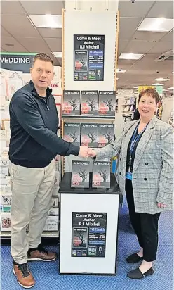  ?? ?? On tour RJ Mitchell pictured with Whsmith cluster manager Dee Shannon at the retailer’s Stirling Thistles outlet