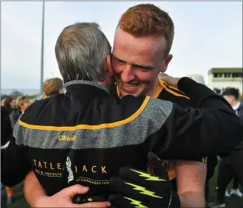  ??  ?? Johnny Buckley of Dr. Crokes celebrates with manager Pat O’Shea after the match on Sunday in Austin Stack Park Photo by Brendan Moran / Sportsfile