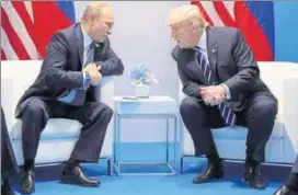  ?? REUTERS FILE ?? Trump with Putin during a bilateral meeting at the G20 summit in Germany last July