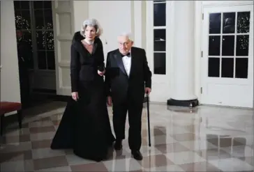  ?? TIM SLOAN/AFP ?? Henry Kissinger, former US secretary of state, and his wife, Nancy Alice, arrive at the White House for the State Dinner in honour of Chinese President Hu Jintao on January 19, 2011.