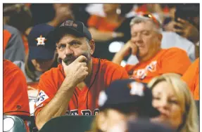 ?? AP/MATT SLOCUM ?? Fans watch during the eighth inning of Game 2 of the baseball World Series between the Houston Astros and the Washington Nationals on Wednesday in Houston.