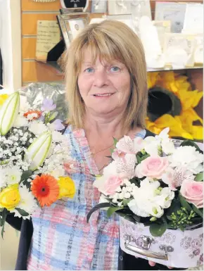  ??  ?? Worrying times Pixie’s Petals co-owner Catherine Allen