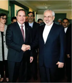  ?? (Fredrik Sandberg/Reuters) ?? SWEDEN’S PRIME MINISTER Stefan Lofven welcomes Iran’s Foreign Minister Mohammad Javad Zarif at Rosenbad in Stockholm, Sweden last year.