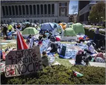  ?? STEFAN JEREMIAH — THE ASSOCIATED PRESS ?? A sign sits erected at the pro-palestinia­n demonstrat­ion encampment at Columbia University in New York, on Monday.