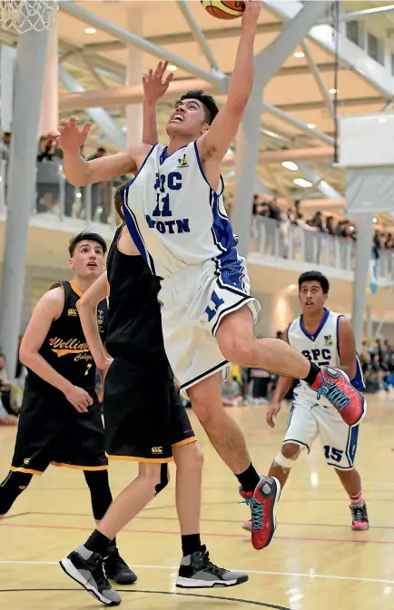  ?? MASANORI UDAGAWA ?? Corey Le’aupepe drives hard to the rim for St Patrick’s College, Town, in their Pohlen Cup final win over Wellington College on Friday.