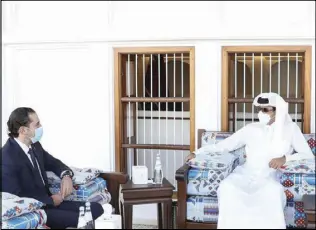  ??  ?? أمير قطر تميم بن حمد خلال لقائه رئيس وزراء لبنان المكلف سعد الحريري في الدوحة