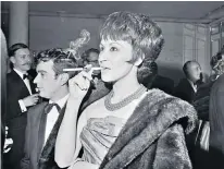  ?? ?? Chita Rivera, above, on the right, with Liane Plane, in West Side Story in 1957, and right, next to Dudley Moore, at an awards ceremony at the Savoy in London in 1962