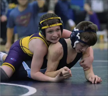  ?? STAN HUDY/THE SARATOGIAN ?? Ballston Spa wrestler Ralph Keeney has control over Columbia’s Matt Hoxie during the Saratoga Invitation­al 99-pound final Saturday afternoon at the High School.