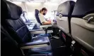  ?? Photograph: Étienne Laurent/EPA ?? A Southwest passenger waits for takeoff in Oakland, California. Nearly 30% of airline employees have taken voluntary retirement or extended leave.