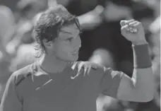  ?? BERNAT ARMANGUE/AP ?? Rafael Nadal of Spain celebrates his semifinal victory over compatriot David Ferrer in Paris on Friday. Nadal won in three sets 6-2, 6-2, 6-1.