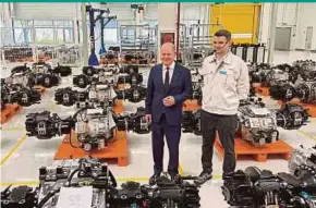  ?? REUTERS PIC ?? German Chancellor Olaf Scholz visiting a Bosch factory for hydrogen drives in Chongqing, China, yesterday.