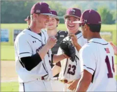  ?? AUSTIN HERTZOG — DIGITAL FIRST MEDIA ?? Conestoga starting pitcher Jacob Marcus, left, is congratula­ted by teammates after exiting the game in the fifth inning of the Pioneers’ 7-6 win over Boyertown Friday.