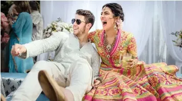  ?? | RAINDROP MEDIA AP ?? Priyanka Chopra and Nick Jonas at their mehendi ceremony at Umaid Bhawan in Jodhpur, India on Saturday.