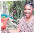  ??  ?? Youthlink writer Chanel was all smiles with this fiery parrot.