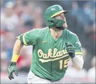  ?? RON SCHWANE — GETTY IMAGES ?? Seth Brown of the A’s rounds the bases after hitting a solo home run in the fourth inning Tuesday night at Cleveland.