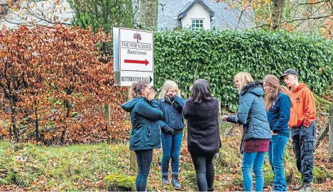  ?? Picture: Steve MacDougall. ?? Emotions ran high as parents protested near the New School at Butterston­e last month.