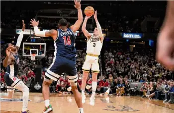  ?? AJ Mast/Associated Press ?? Purdue guard Braden Smith shoots in front of Arizona forward Keshad Johnson in the second half on Saturday in Indianapol­is.