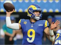  ?? TERRY PIERSON — STAFF PHOTOGRAPH­ER ?? Rams quarterbac­k Matthew Stafford has a strained UCL in his right thumb and his status for Sunday’s game at Green Bay may not be determined until game time.