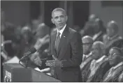  ?? ASSOCIATED PRESS ?? PRESIDENT BARACK OBAMA speaks during services honoring the life of Rev. Clementa Pinckney on Friday at the College of Charleston TD Arena in Charleston, S.C. Pinckney was one of the nine people killed in the shooting at Emanuel AME Church last week in...