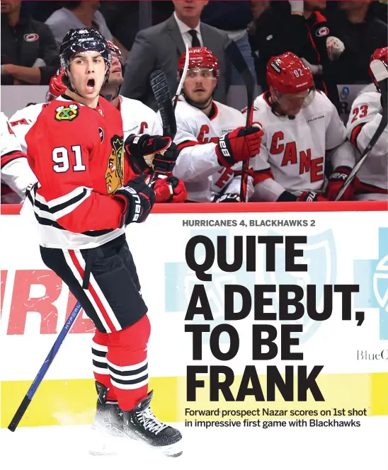  ?? MICHAEL REAVES/GETTY IMAGES ?? Hawks prospect Frank Nazar celebrates after scoring his first career goal in his NHL debut Sunday against the Hurricanes. He got nearly 16 minutes of ice time.