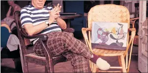  ??  ?? STILL LIFE PORTRAIT: Pablo Picasso in his favourite chair and, inset left, Joey