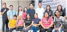  ?? ?? SC Corporate Affairs, Brand and Marketing Head Mai Sangalang (2nd from right, standing) and ASKI President Rolando Victoria (3rd from right, standing) led the launch of Futuremake­rs by Standard Chartered program ‘Lifting Participat­ion of Women Youth through Microentre­preneurshi­p.’