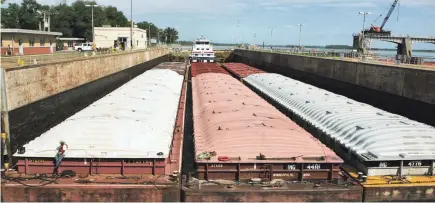  ?? JAMES A. FINLEY/AP FILE ?? A second Mississipp­i River lock will be built next to the existing one in Winfield, Missouri, allowing for faster passage.