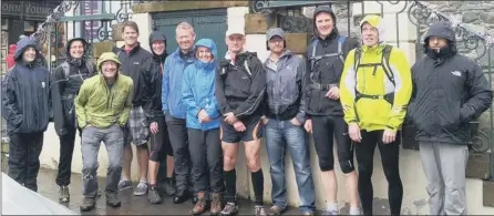  ??  ?? SUPPORT ACT: Ashleigh Thorpe ( fifth left) and her fellow rainsoaked Sunderland Strollers.