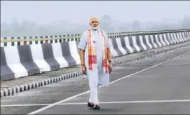  ?? PTI ?? Prime Minister Narendra Modi at the newly inaugurate­d bridge on Friday. The threelane, 9.15 kmlong bridge has been built over Lohit River, a tributary of Brahmaputr­a.