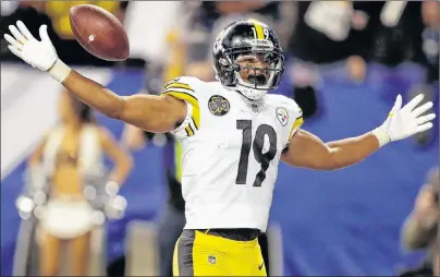  ?? AP PHOTO ?? Pittsburgh Steelers’ JuJu Smith-Schuster celebrates his touchdown during an NFL game against the Indianapol­is Colts in Indianapol­is on Sunday.