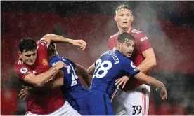  ?? Photograph: Michael Regan/AP ?? Manchester United’s Harry Maguire (left) and Scott McTominay jostle for position with Chelsea’s César Azpilicuet­a (second right) and Reece James.