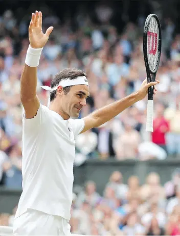  ?? GARETH FULLER/AFP/GETTY IMAGES ?? Switzerlan­d’s Roger Federer celebrates after beating the Czech Republic’s Tomas Berdych in their men’s semifinal match at Wimbledon on Friday. Federer won the match 7-6, 7-6, 6-4.