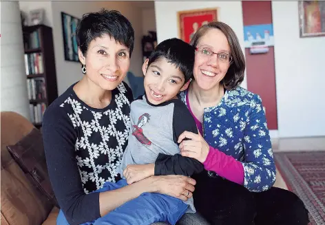  ??  ?? Natasha Bakht and Lynda Collins with their son, seven-year-old Elaan