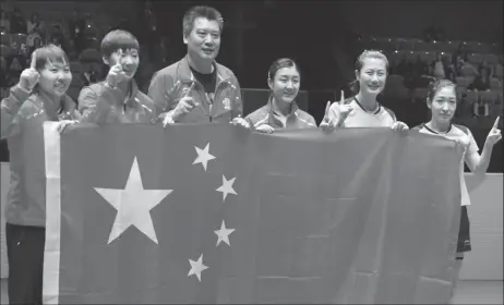  ??  ?? Another title win for the Chinese women’s team to celebrate (Photo: Rémy Gros/ITTF)