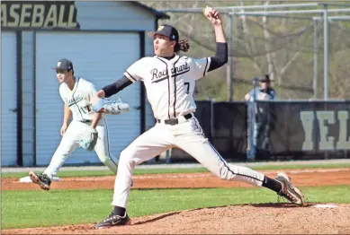  ?? Jeremy Stewart ?? Rockmart pitcher Hunter Atkins goes through his delivery during a game against Cedartown at Rockmart High School on March 4. The Yellow Jackets won the game 2-1 on a walkoff hit in the bottom of the eighth inning.