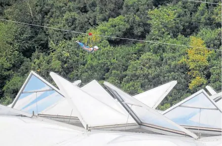  ?? ?? The 700m-long zip-wire at the Eden Project is one of the most spectacula­r activities for adrenaline junkies.