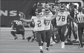  ?? SAM CRAFT/AP ?? Titans kicker Sam Sloman celebrates after nailing the game-winning 37-yard field goal Sunday.