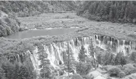  ??  ?? A bird’s eye view of the Jiuzhaigou scenic spot in the southweste­rn Sichuan Province. — IC