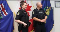  ?? HERALD PHOTO BY JUSTIN SIBBET ?? LPS Constables Allison Williams and Mike Darby help announce a recruiting event set for Friday at Lethbridge College.