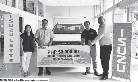  ??  ?? The 300,000th unit sold in Isuzu Leyte. Isu zu Ph ilippines