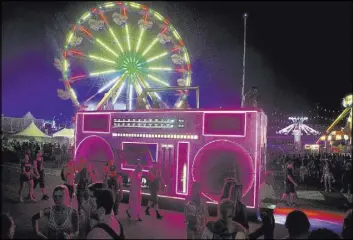  ?? Bridget Bennett Las Vegas Review-Journal @bridgetkbe­nnett ?? The Boombox artcar makes its way through the Electric Daisy Carnival festival Friday.